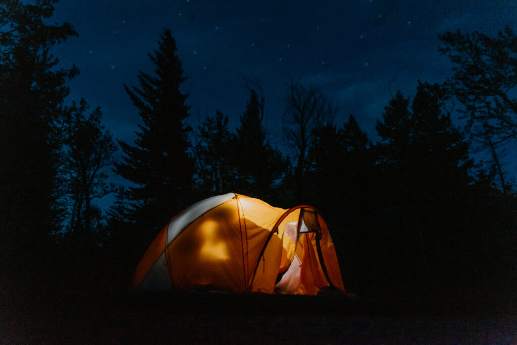 couple camping under the stars in Alberta, Canada
