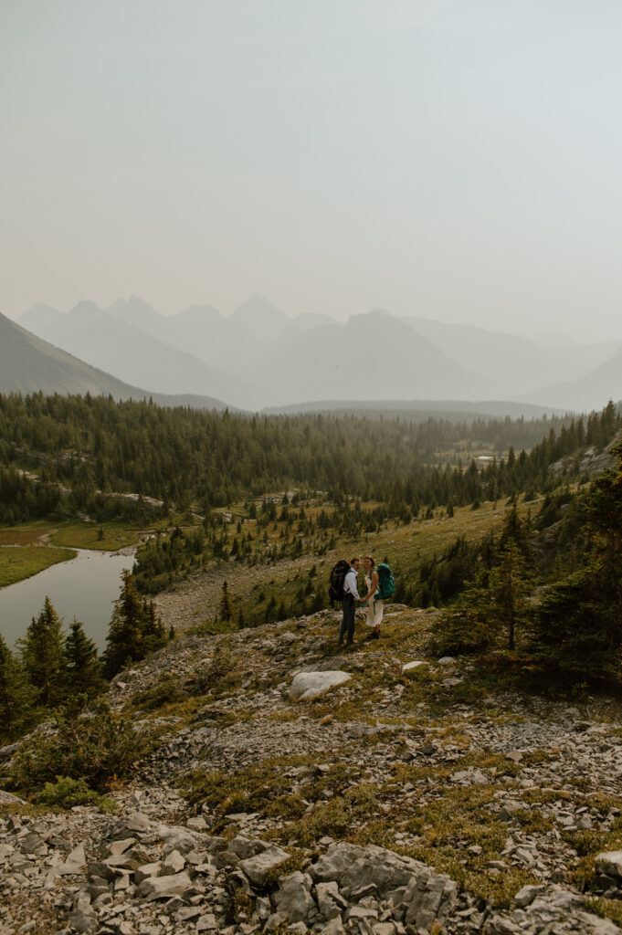 Hiking elopement couple in the mountains of Alberta, Canada