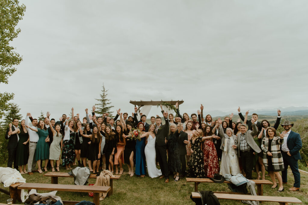 big group shot after wedding ceremony in Southern Alberta