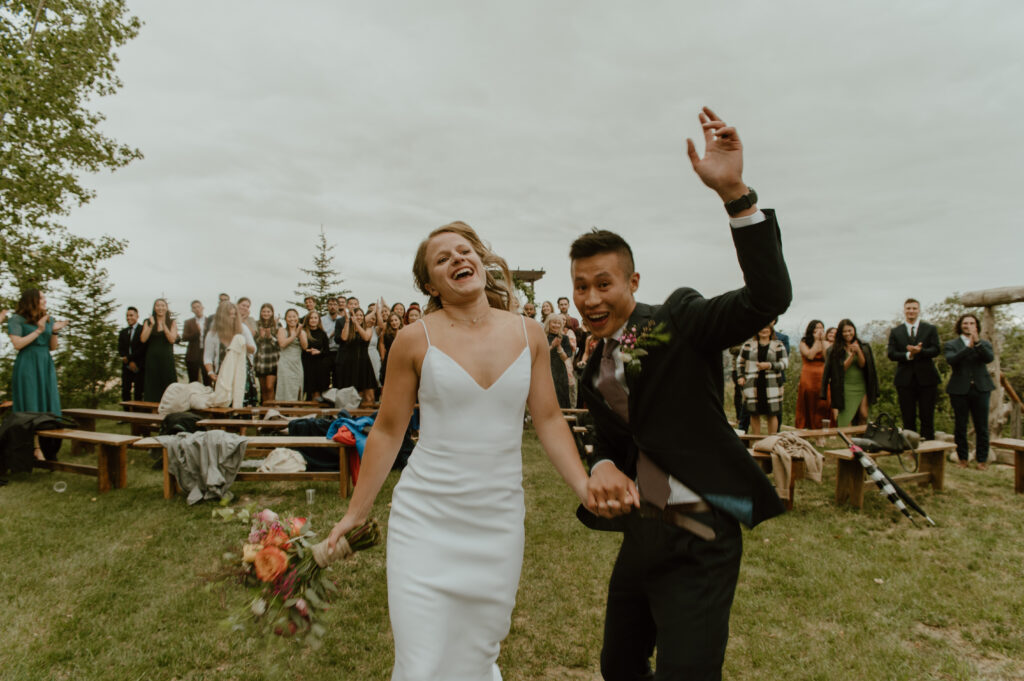 couple celebrating just being married after ceremony in southern Alberta