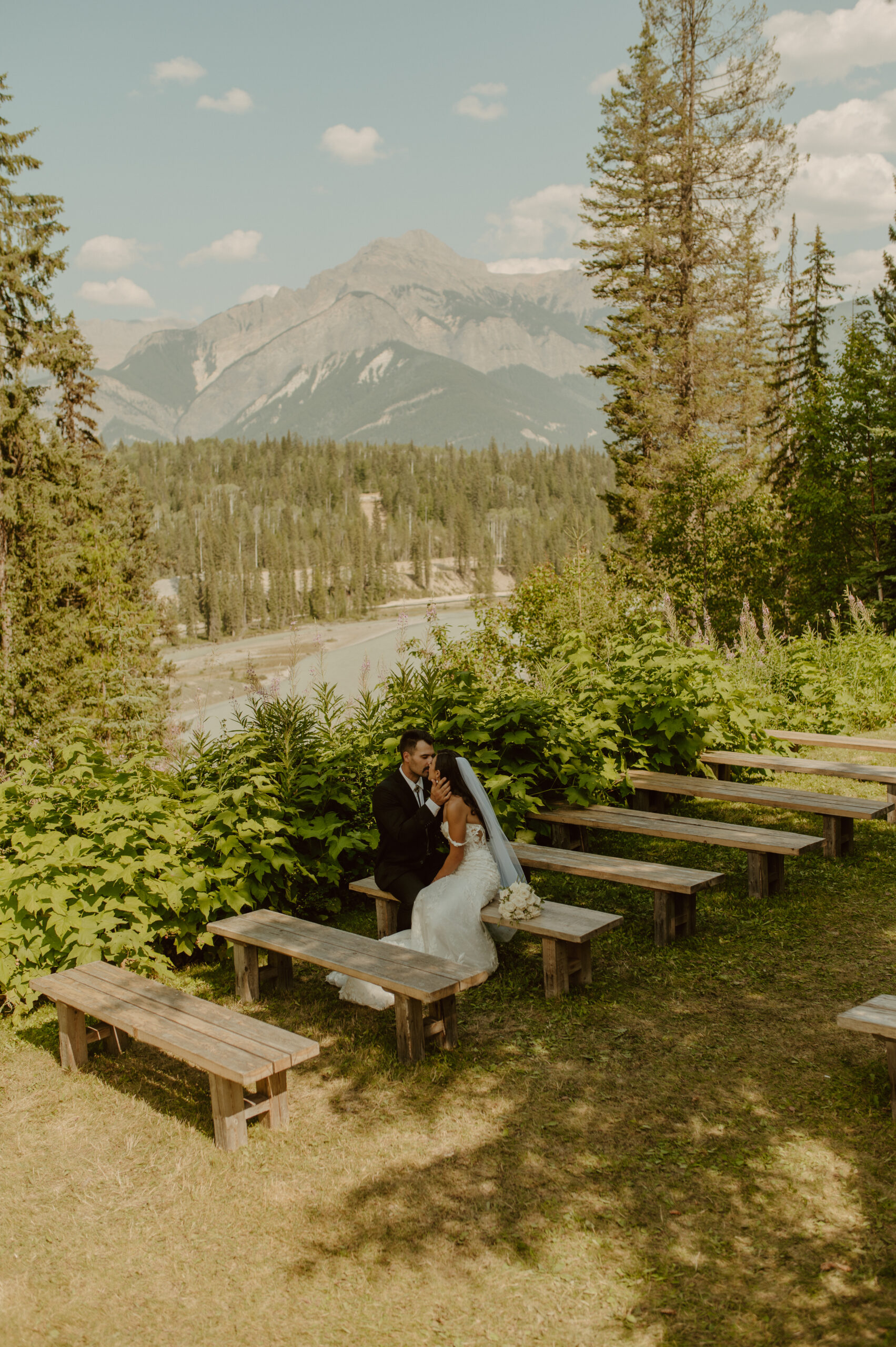 bride and groom enjoying post wedding feels in the mountains