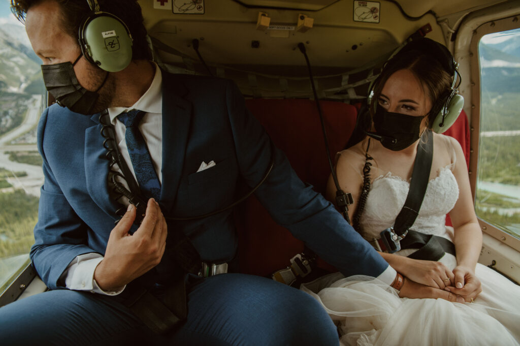 elopement couple in helicopter in Canmore, Alberta
