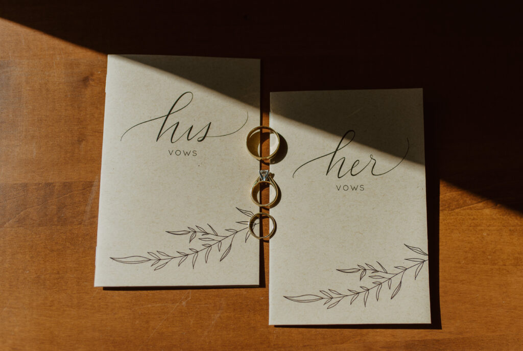 detail shot of vow books before a Canadian mountain elopement