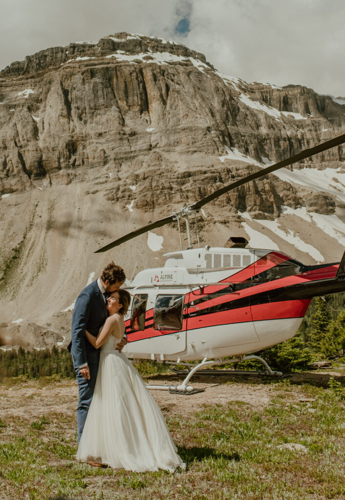 bride and groom at their helicopter elopement location in Banff, Canada